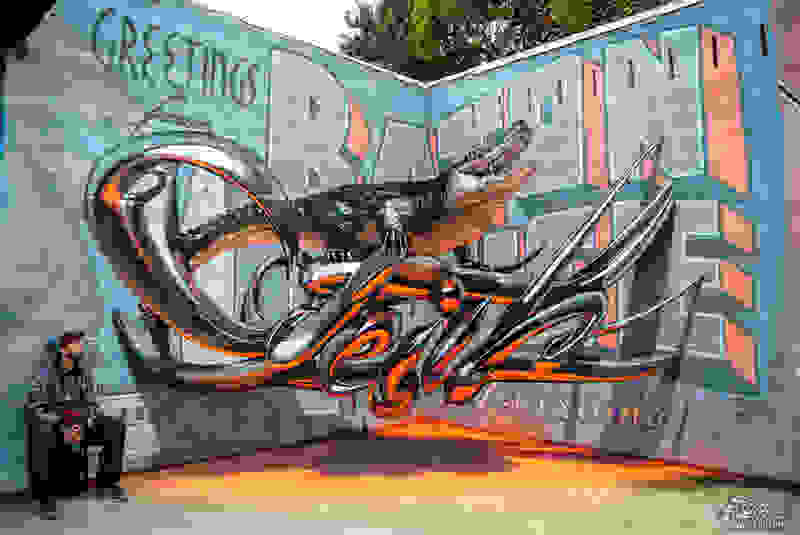 Odeith-aligator-stading-on-Anamorphic-3d-chrome-letters-Greetings-from-Baton-Rouge.jpg